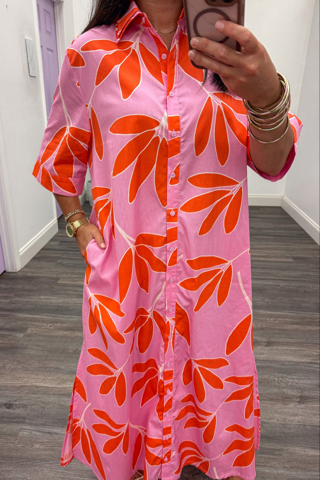 pink with orange and white palm leaf print collared neckline button front short sleeve maxi dress