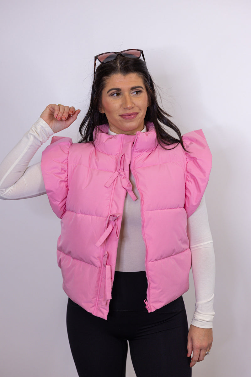 pink puffer bow detail vest