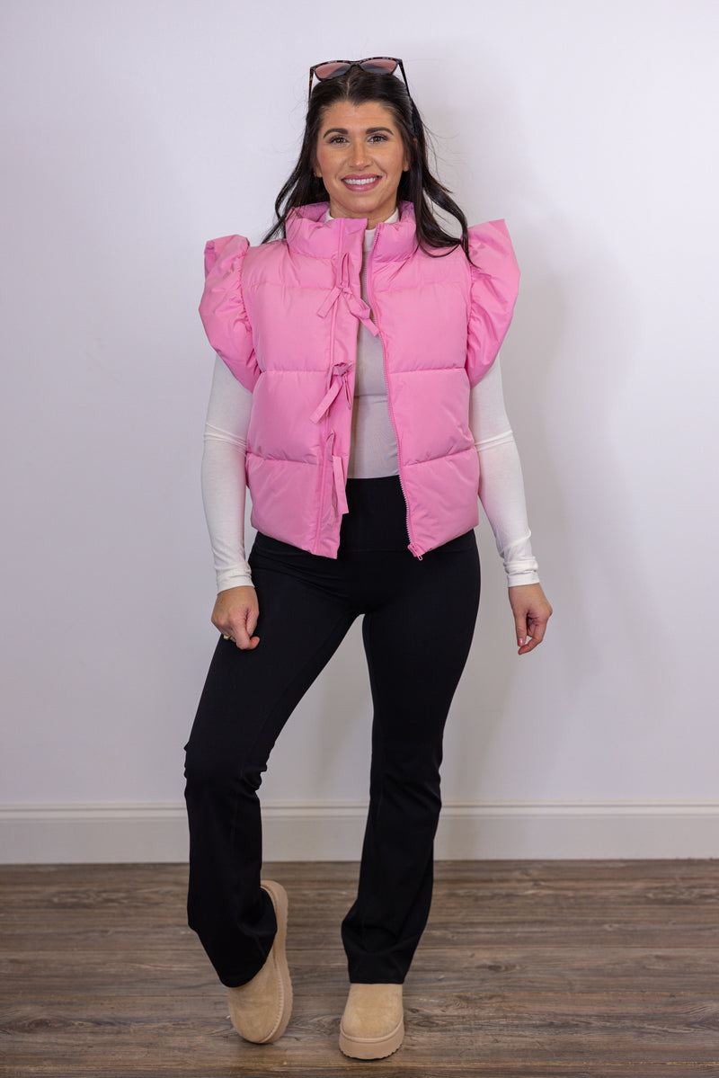 pink puffer bow detail vest