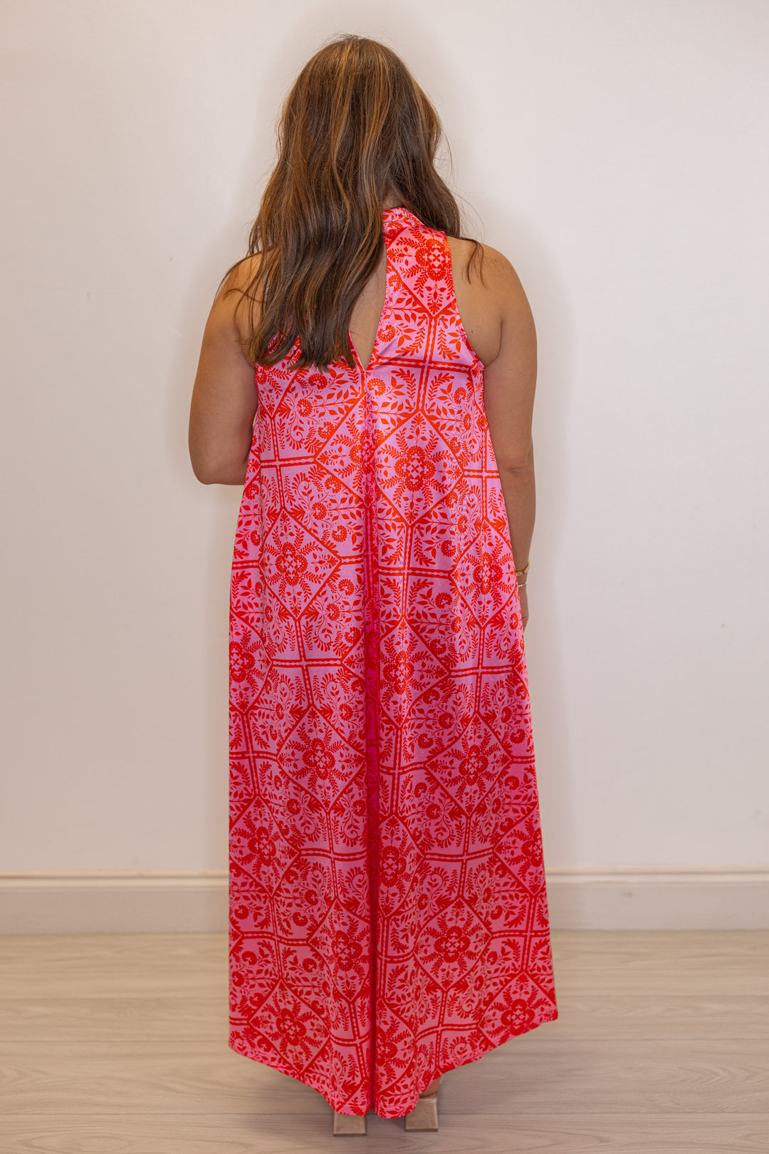 Women's pink and red floral print halter maxi dress by Karlie showing full back view
