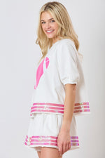 Peach Love California White french terry knit top with a large pink fuzzy football accented with sequins