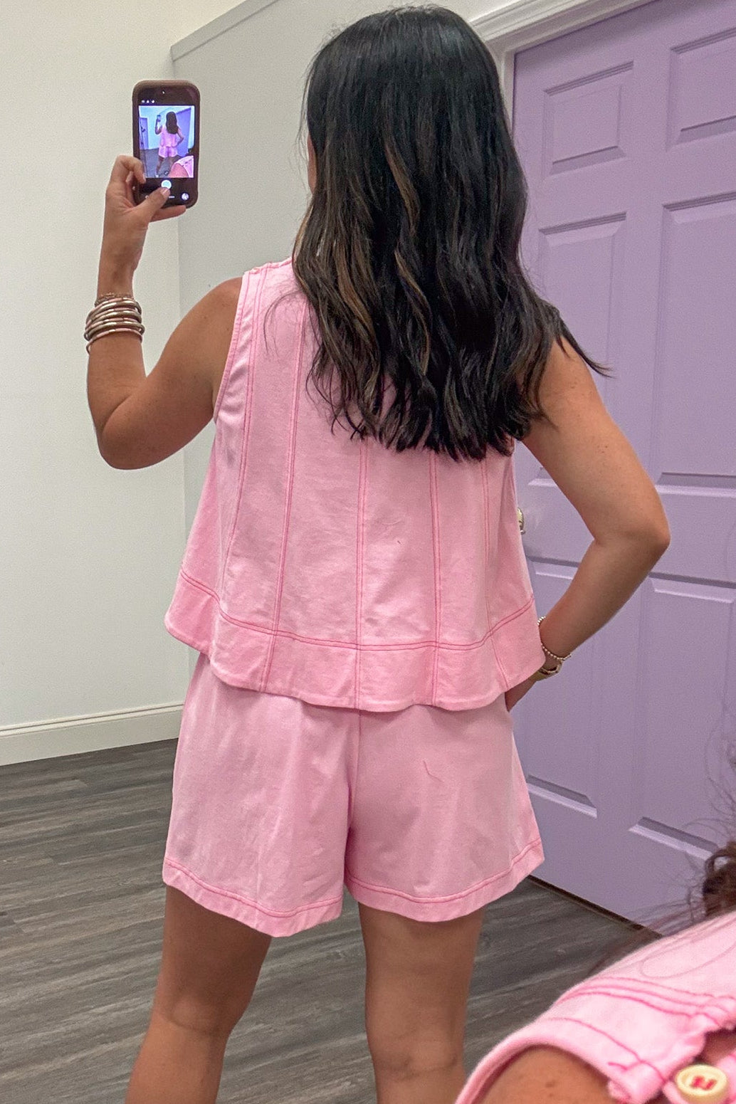 light pink with hot pink stitching sleeveless semi-cropped lightweight knit top