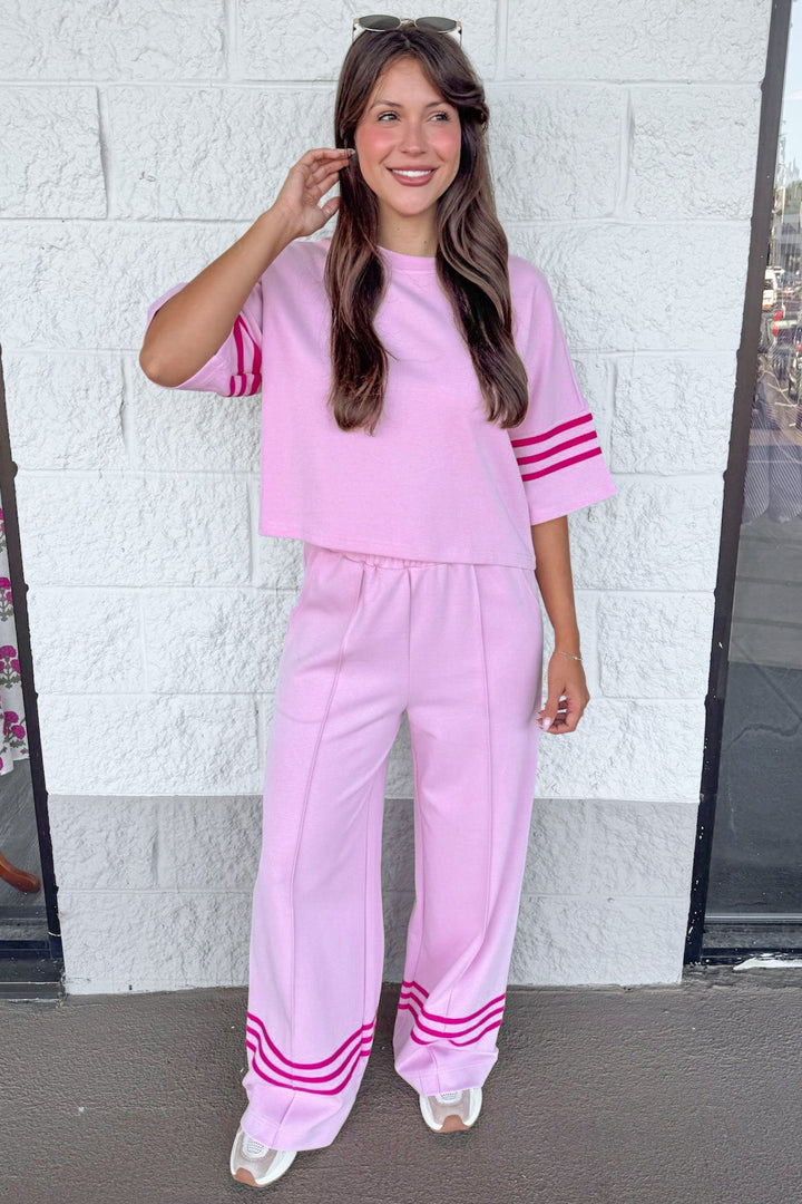 light pink with hot pink stripes at hem elastic waist wide leg knit pants