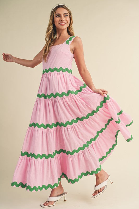 &merci Pink sleeveless tiered midi dress with green piping trim