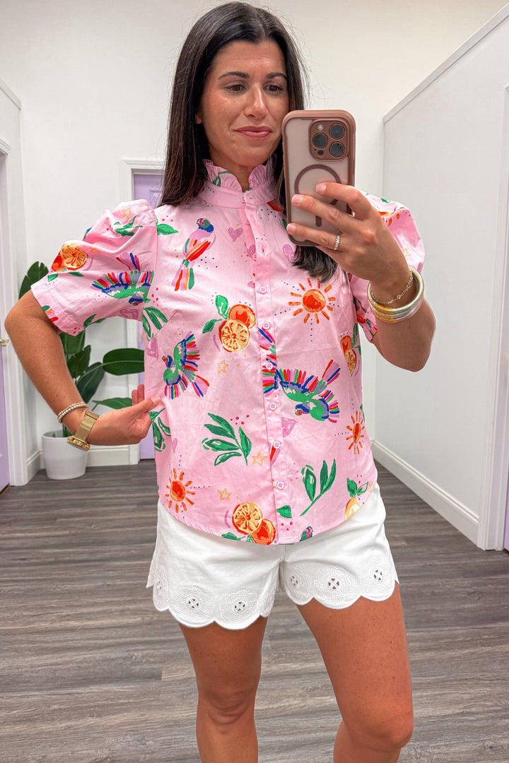 light pink with tropical themed print button down short sleeve relaxed fit top