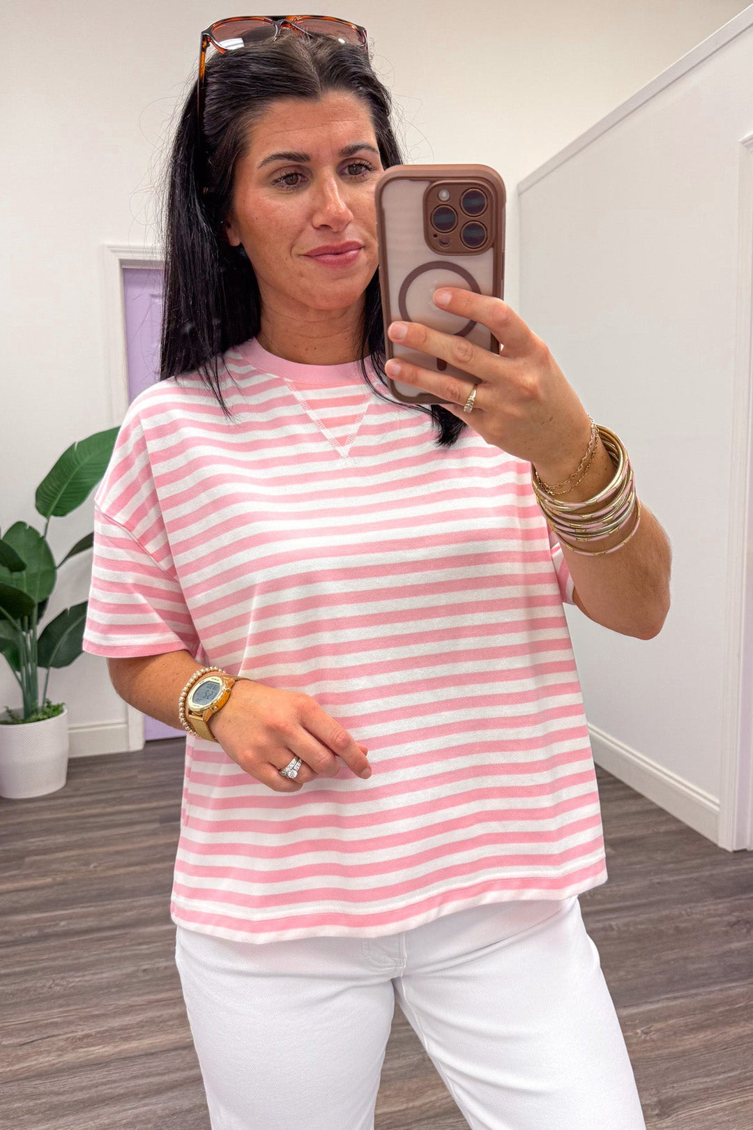 light pink and white horizontal striped drop shoulder short sleeve knit top