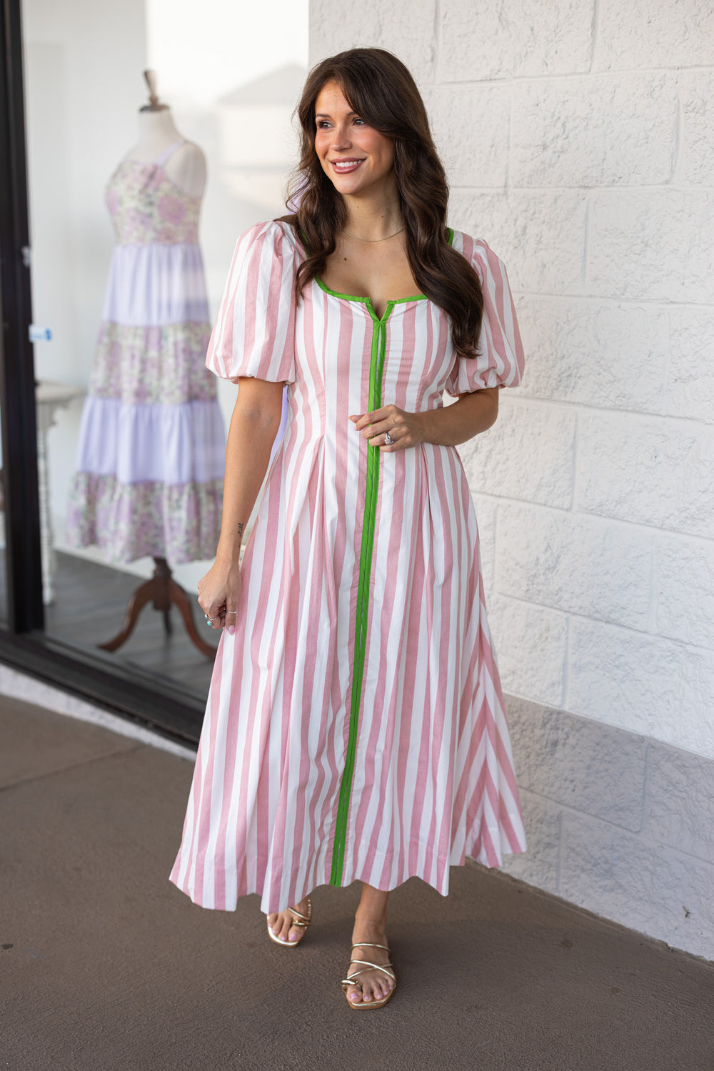 pink and white vertical striped midi dress with green piping trim puff sleeves