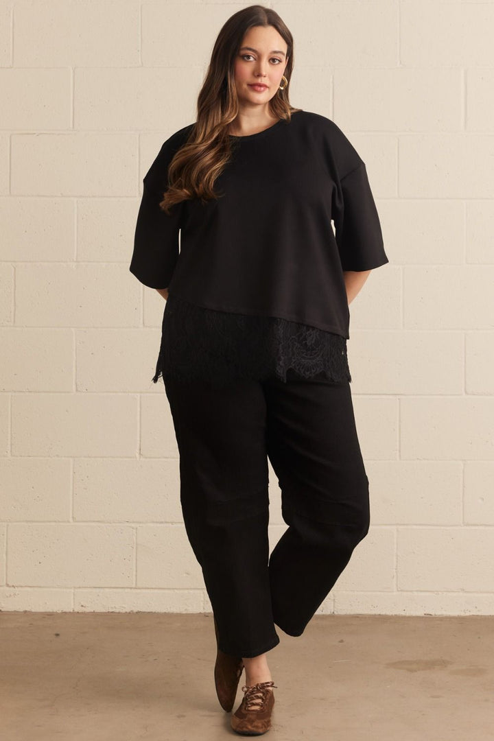 Entro black top with asymmetrical tiered lace detail at the hem in plus size