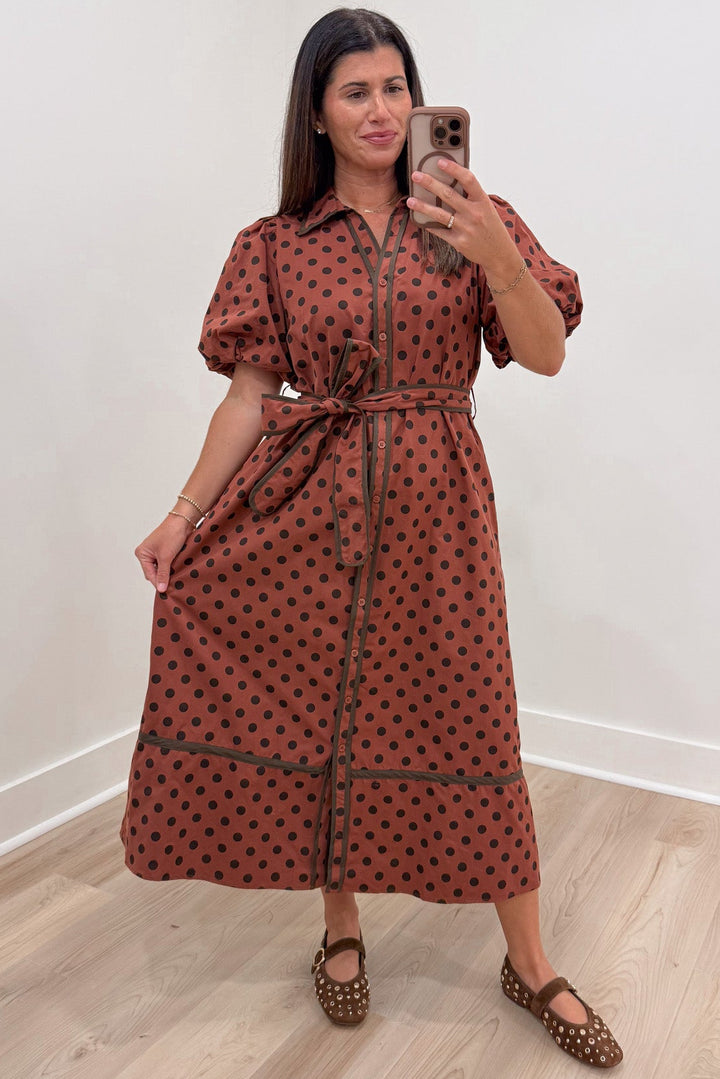brick red with brown polka dot print puff sleeve button front cotton poplin midi dress with removable belt at waist