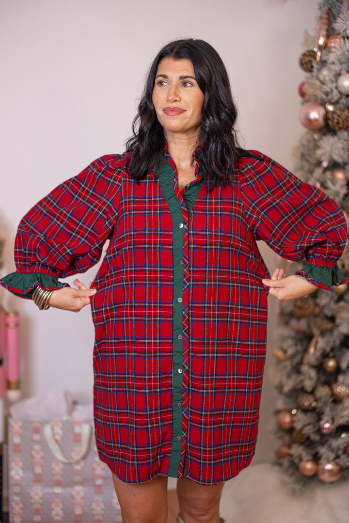 Women's red and green plaid flannel button front dress with ruffle details by Entro showing true to size fit