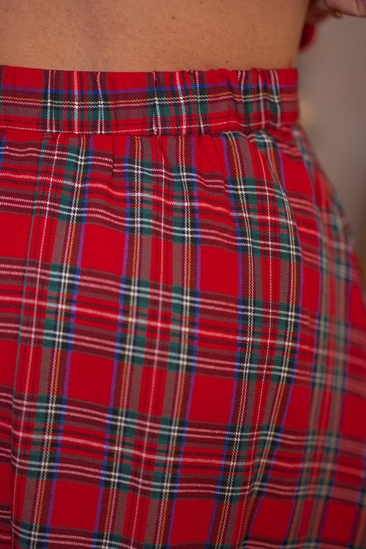 Women's red and green plaid midi skirt by Entro showing elastic waistband in back