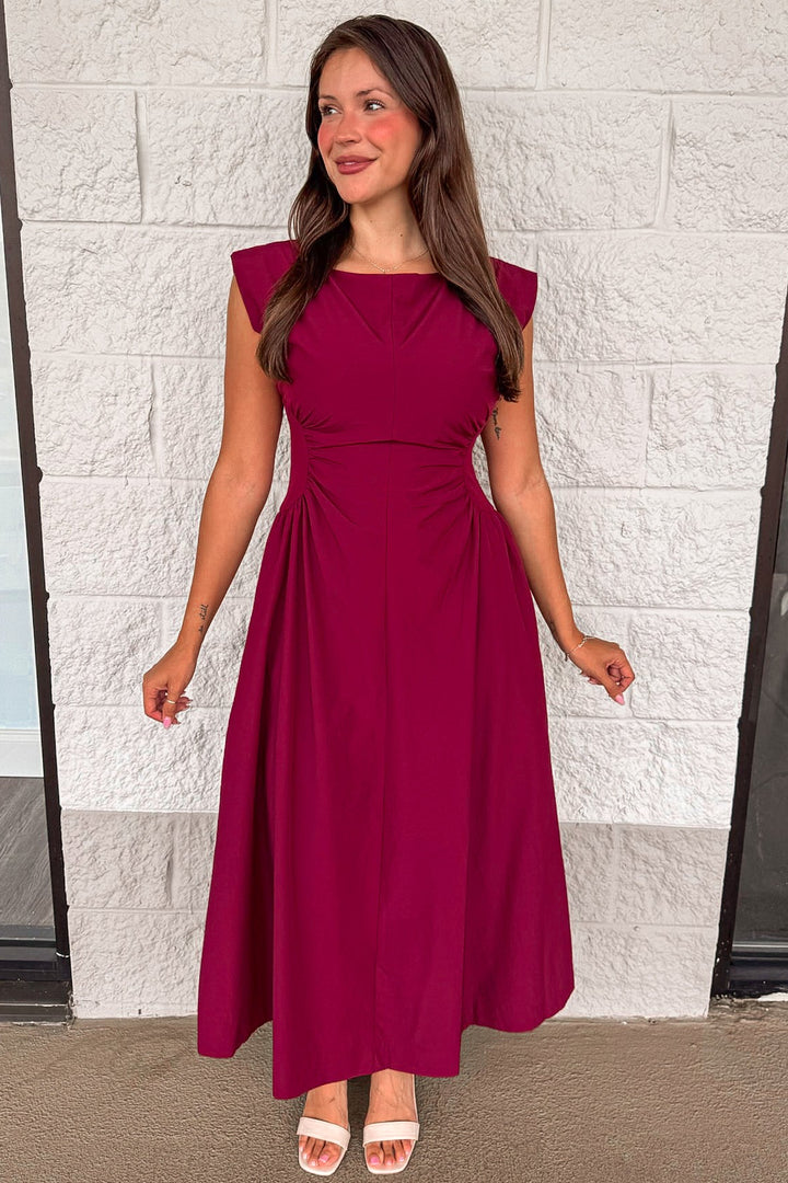 solid wine red cinched waist sleeveless midi dress with fitted bodice