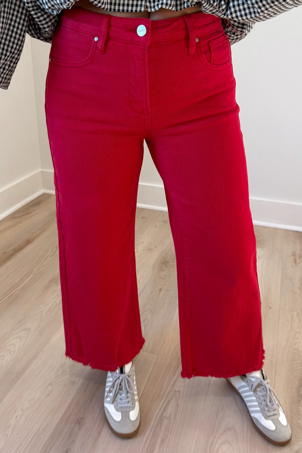 solid red denim high rise cropped wide leg frayed hem tummy control jeans with button zipper fly