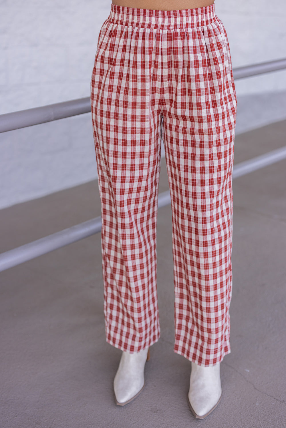 Women's rust and taupe plaid wide leg pants by Wishlist showing up close front view