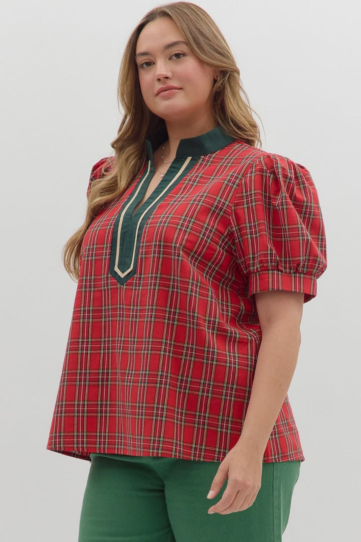 Women's red and green plaid top with green and cream trimmed v neckline by Entro in plus showing slight side view
