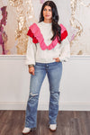 red pink ruffle sweater