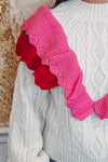 red pink ruffle sweater