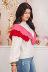 red pink ruffle sweater