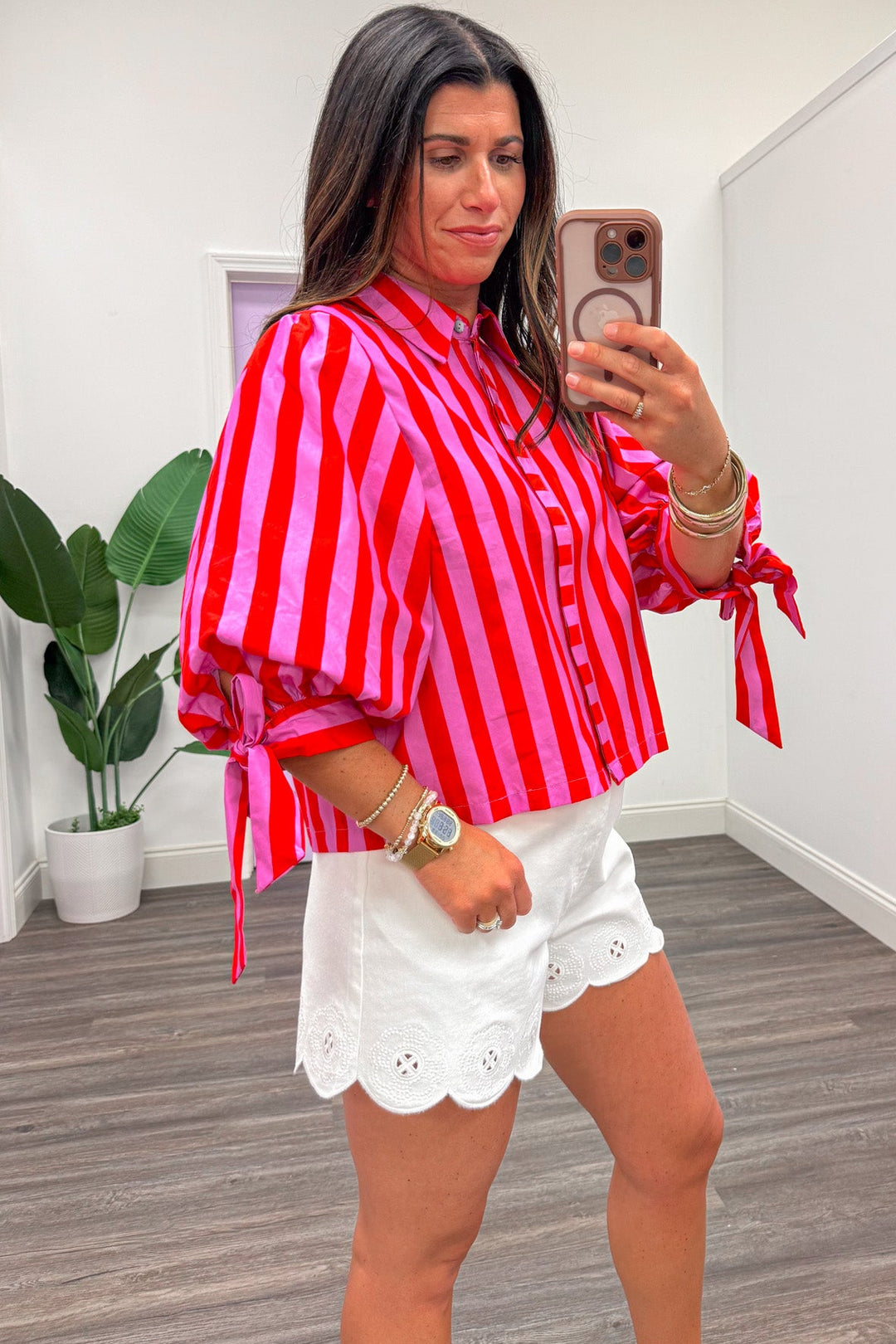 red and pink striped button front 1/2 length puff sleeve poplin top