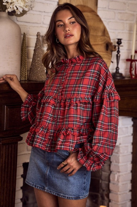 Women's red and green plaid button front top with ruffle trim by So Me showing side view