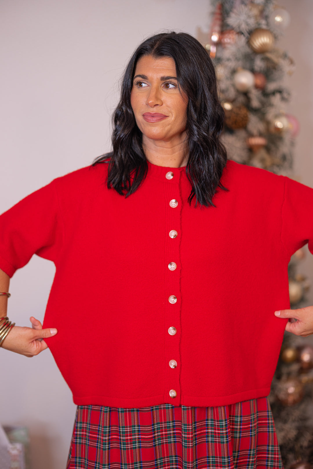 Women's red brushed sweater knit button front top by Wishlist showing true to size fit