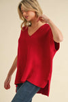 Jodifl Red ribbed boxy sweater with a v neckline and short dolman sleeves