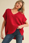 Jodifl Red ribbed boxy sweater with a v neckline and short dolman sleeves