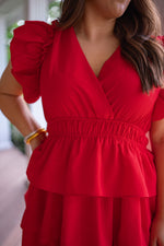 red tiered cocktail attire dress