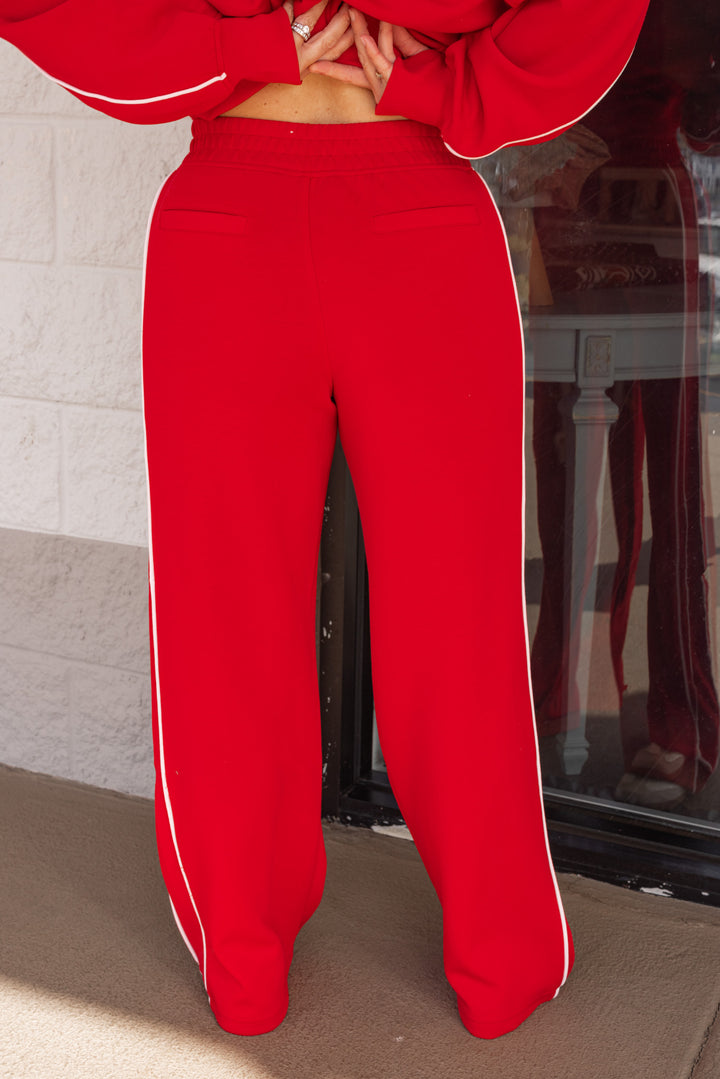 Women's red and ivory scuba knit straight leg pants by Rae Mode showing up close back view