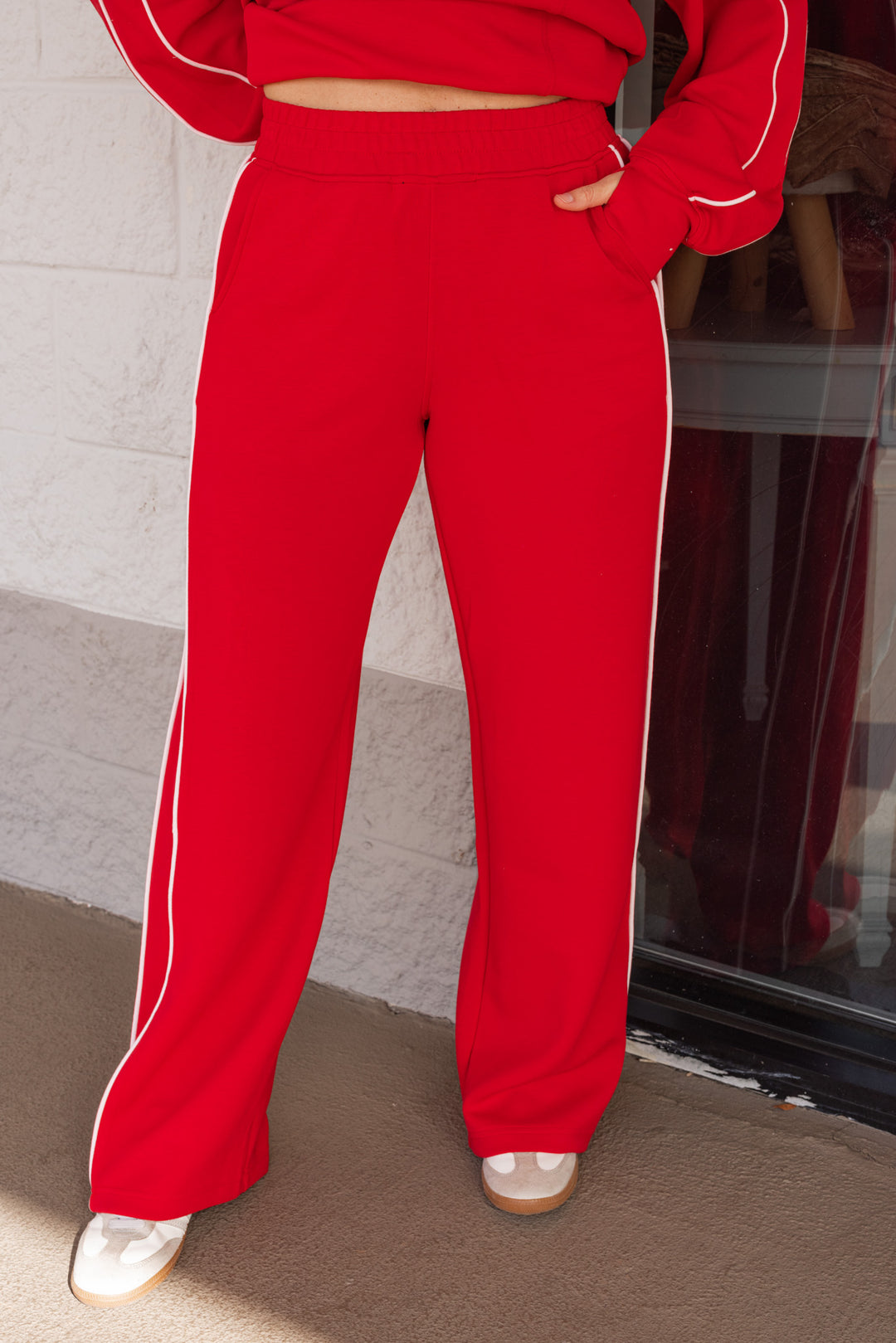 Women's red and ivory scuba knit straight leg pants by Rae Mode showing up close front view