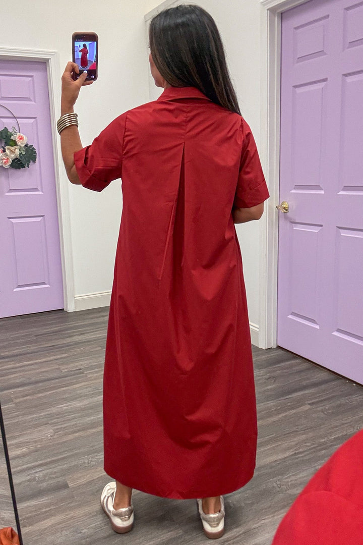 solid brick red with decorative gold button snap bodice short sleeve midi dress with gathered back detail