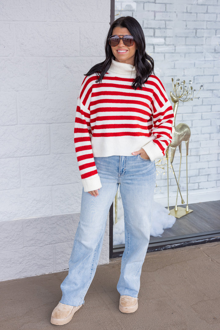 Women's red and cream striped knit cropped turtleneck sweater by hyfve showing full front view
