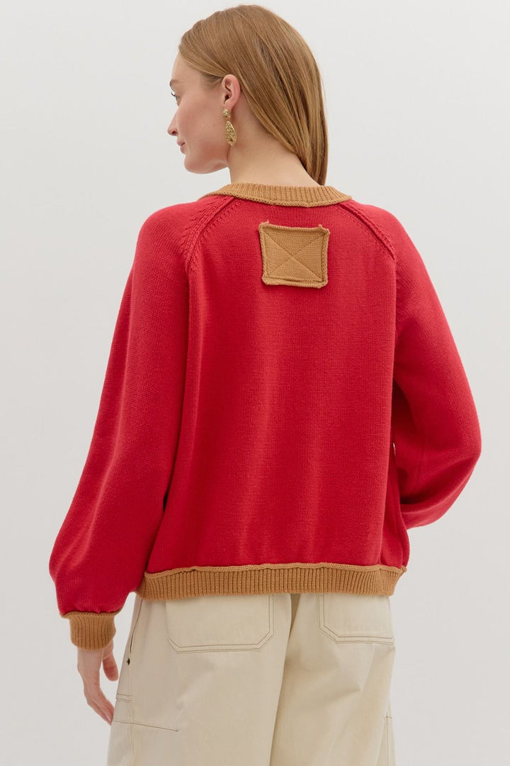 Women's red button front sweater cardigan with caramel trim by Entro showing back view