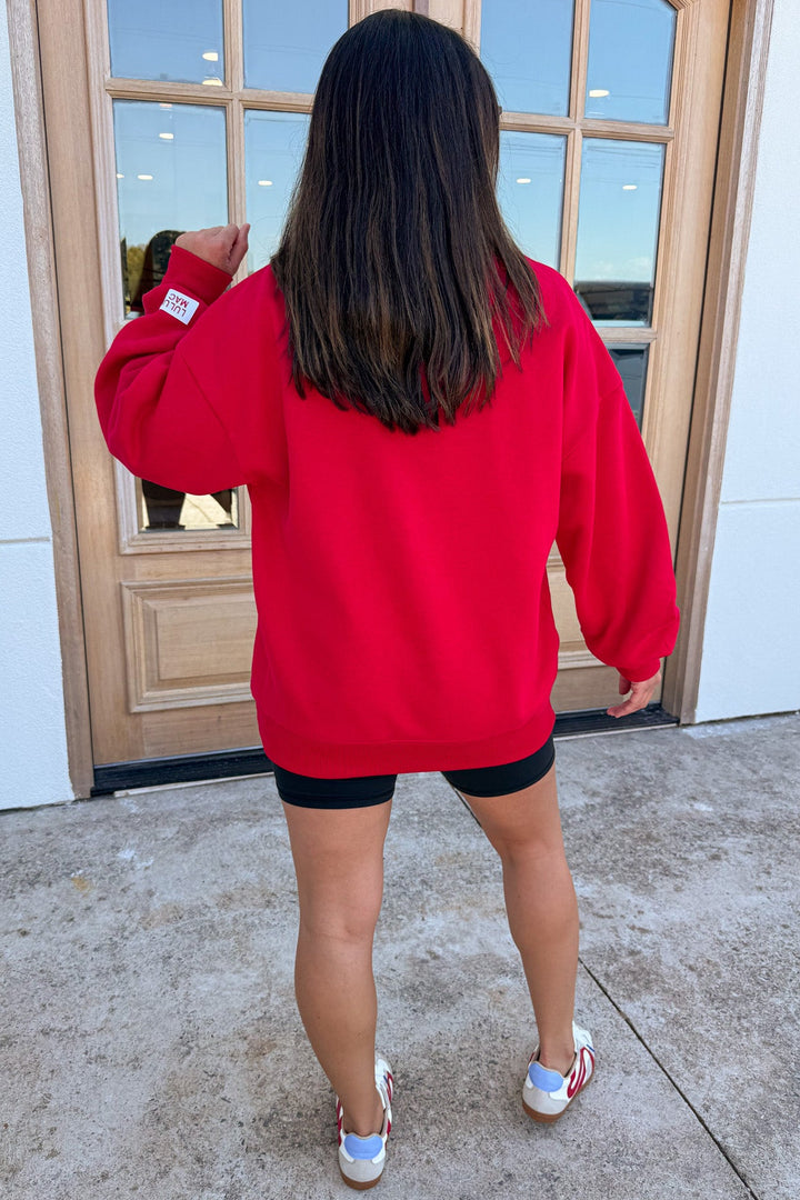 bright red with white embroidered lulu mac long sleeve sweatshirt with banded bottom hem