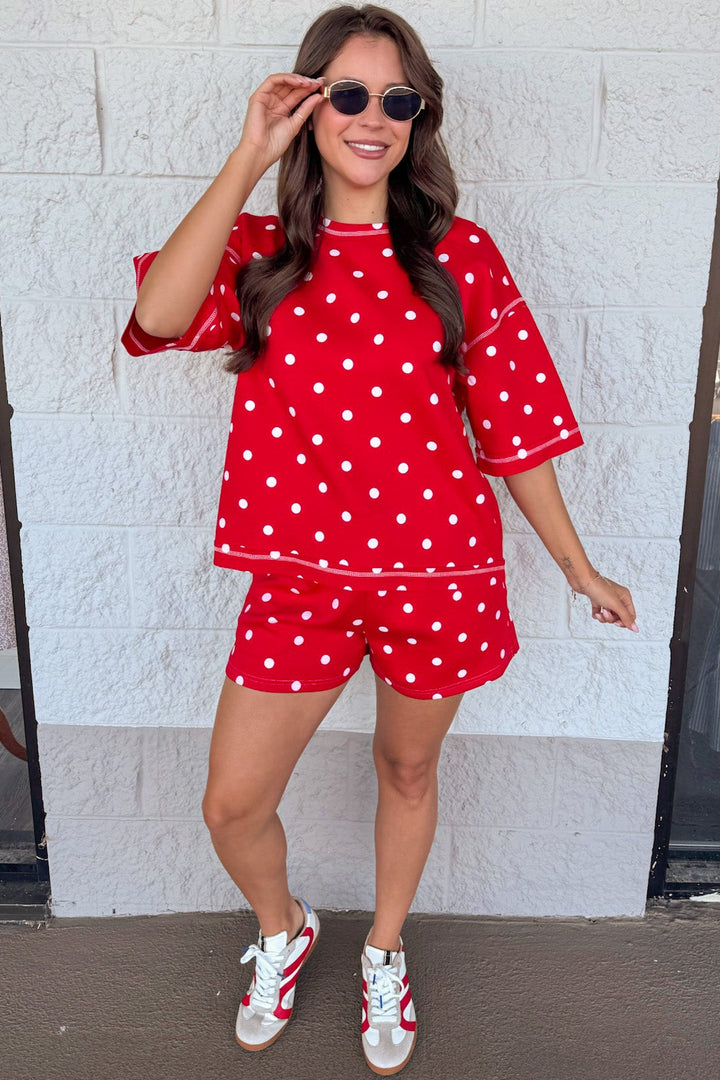 red with white polka dot print top and shorts matching knit athleisure set