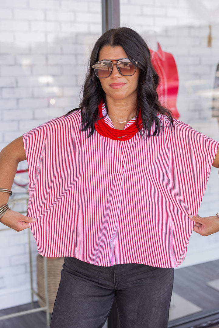 Women's red and and white striped dolman short sleeve top by Karlie showing boxy fit