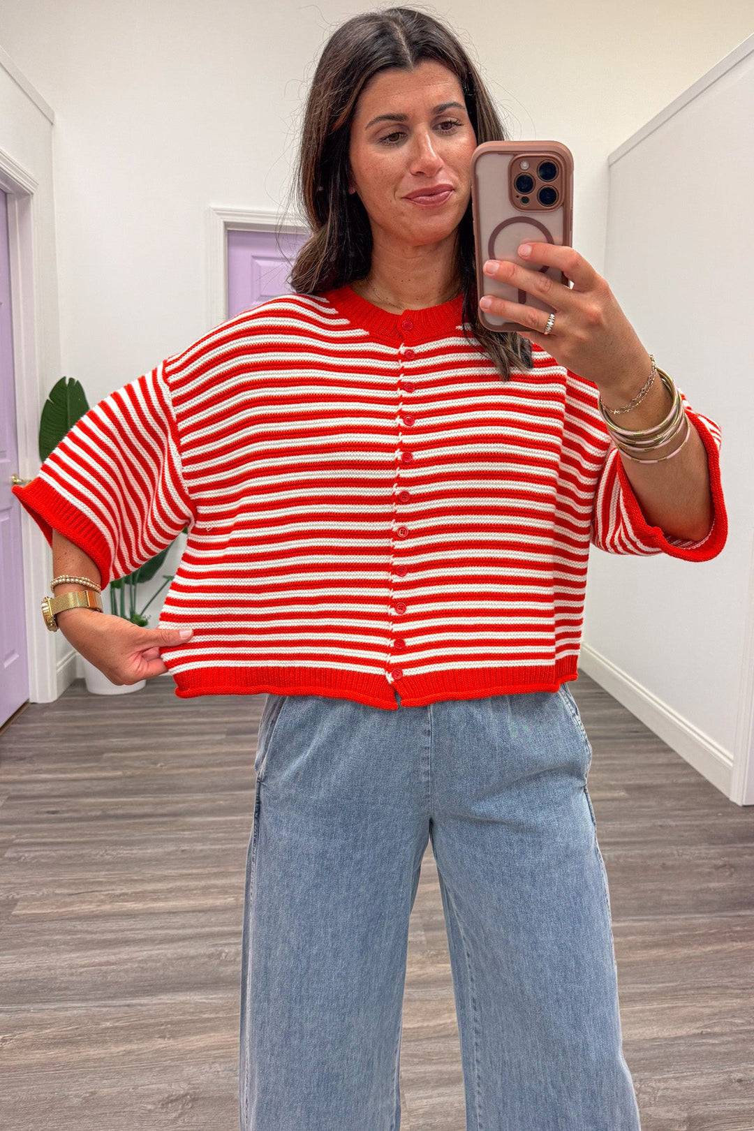 red and off white striped semi-cropped button front relaxed silhouette cardigan top