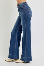 Risen Jeans dark washed denim flare jeans with patch pockets