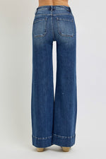 Risen Jeans dark washed denim flare jeans with patch pockets