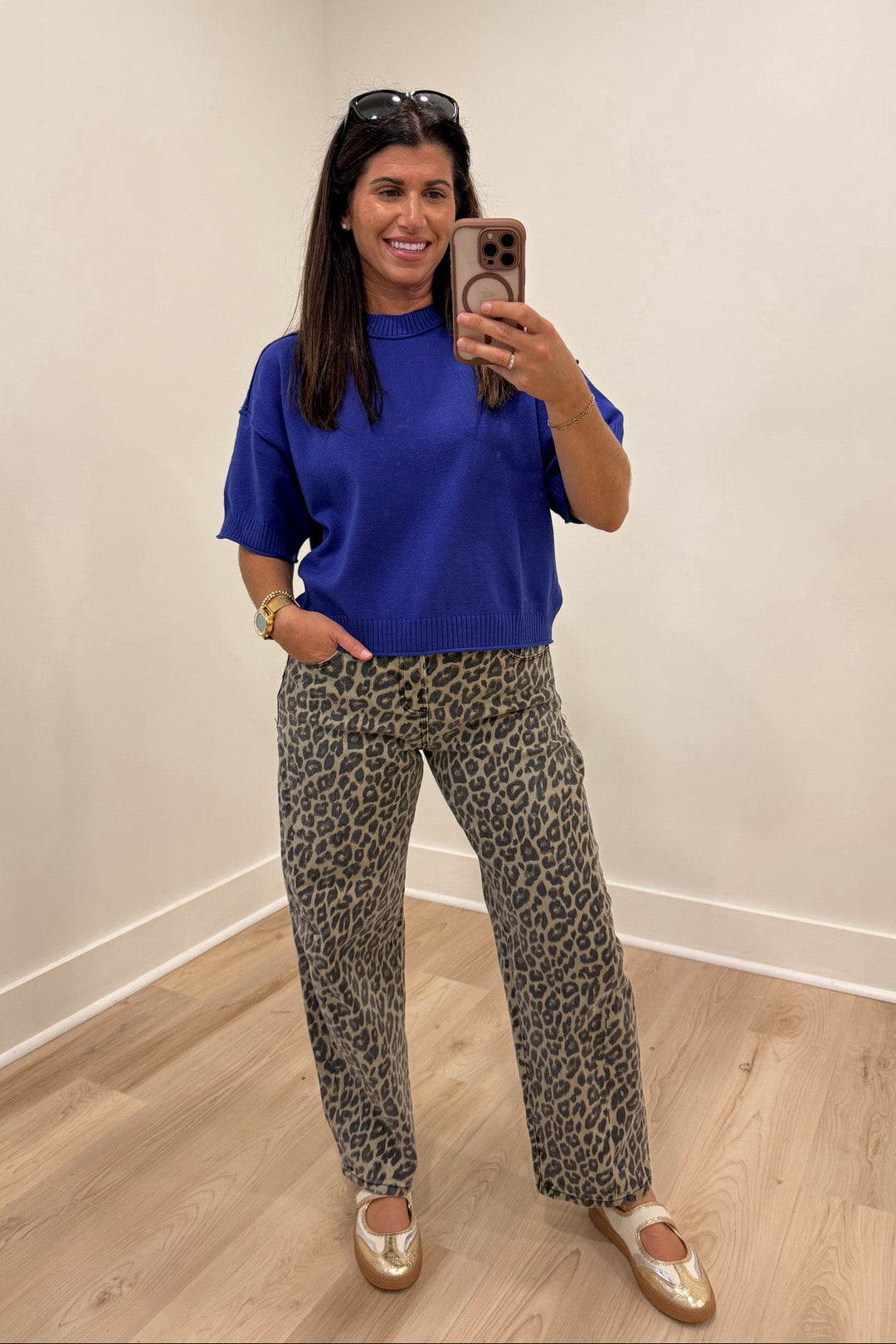 royal blue sweater knit top with leopard print pants