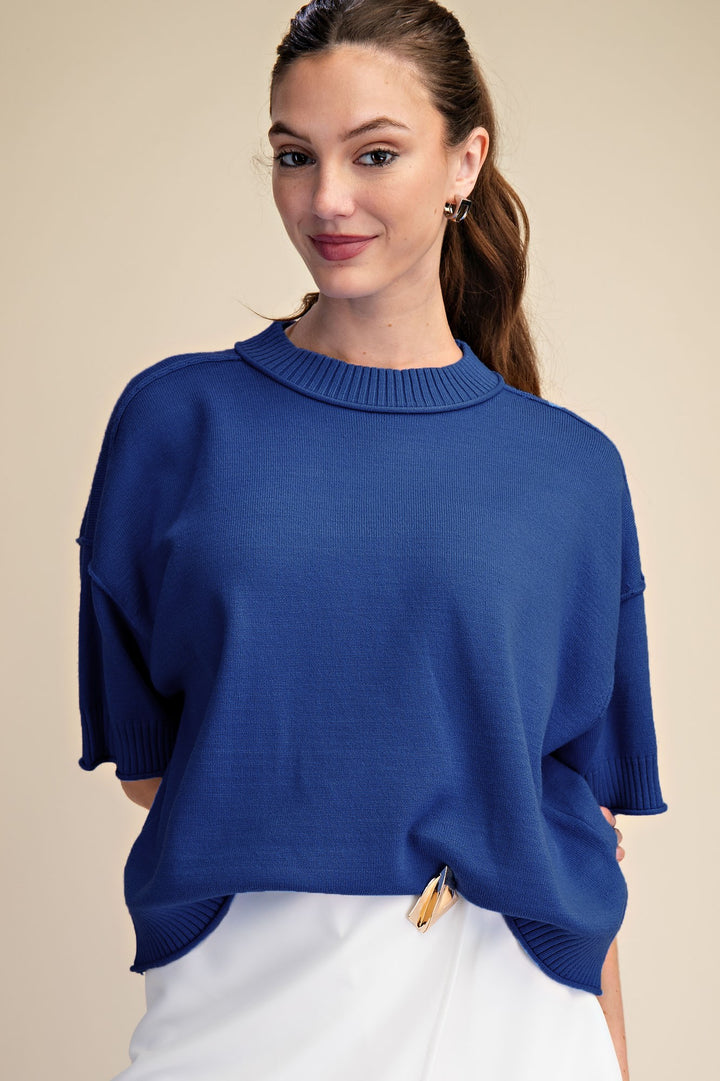 Royal blue knit top with 1/2 length sleeves