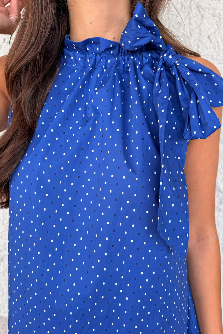 royal blue with white and navy square polka dot print sleeveless self tie mock neck midi dress