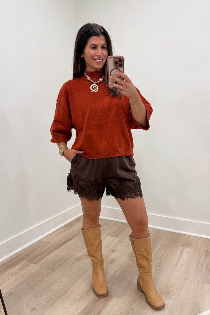rust sweater knit top with satin lace brown shorts
