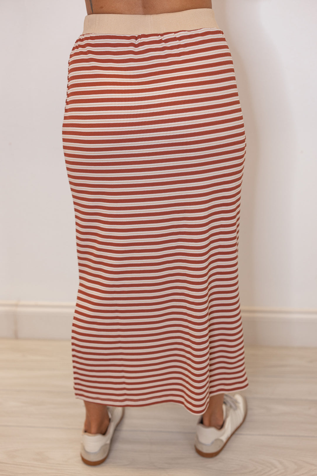 Women's textured knit rust and taupe striped midi skirt with matching top by Wishlist showing back view of skirt