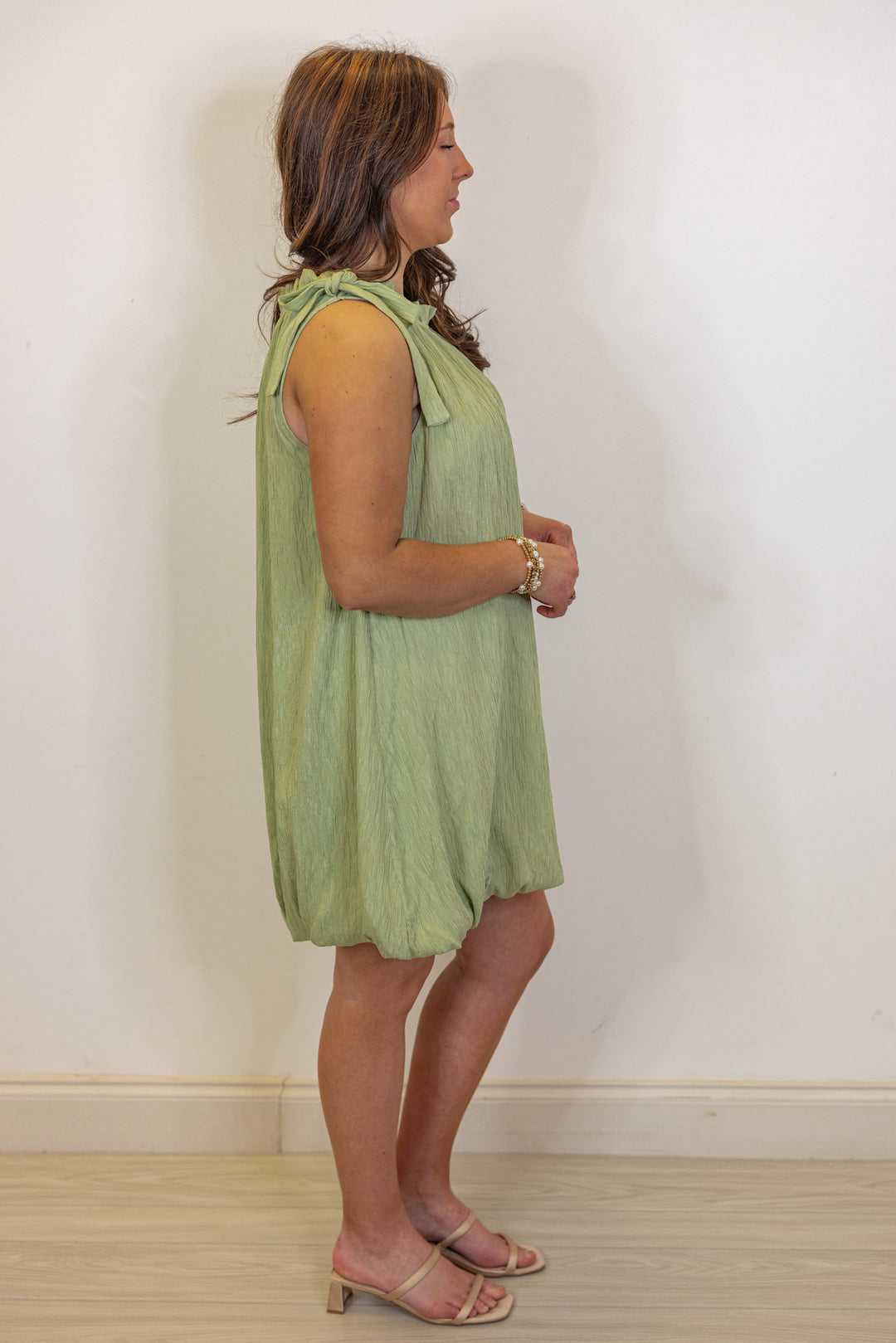 green textured bubble hem short dress