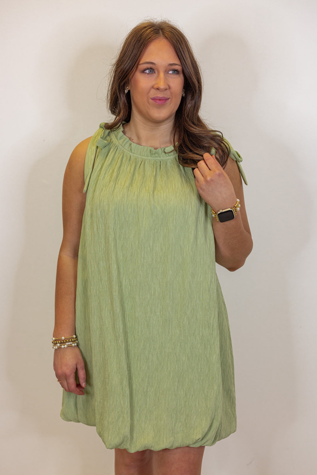 green textured bubble hem short dress