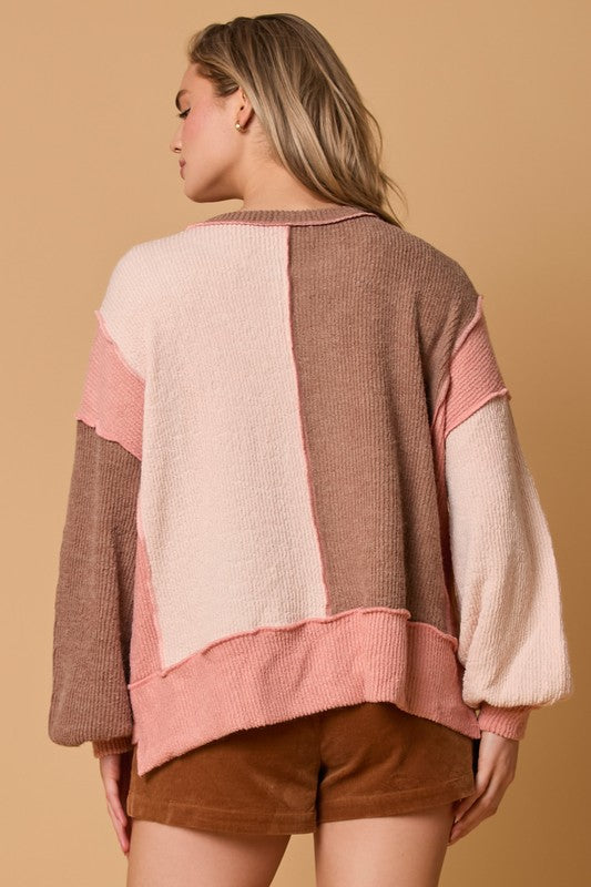 Women's salmon and blush colorblock textured knit pullover top by Fantastic Fawn showing back view