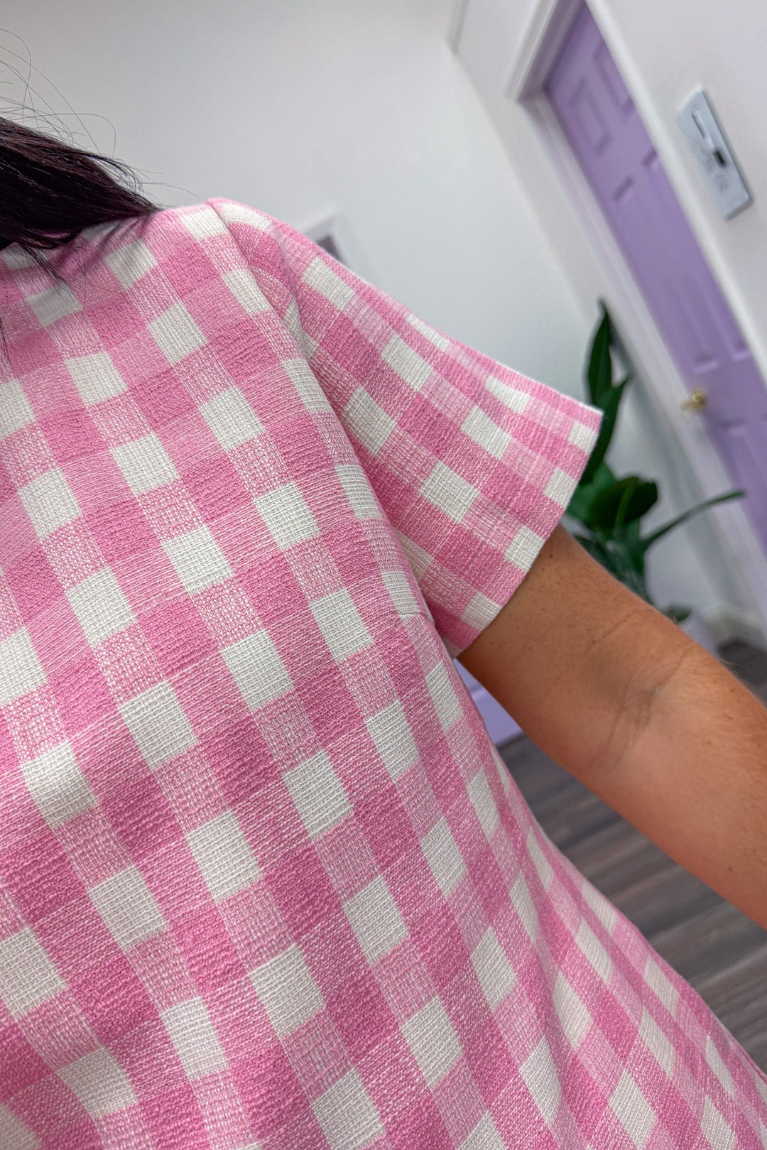 Women's pink and cream gingham print dress with scalloped hem with short sleeves