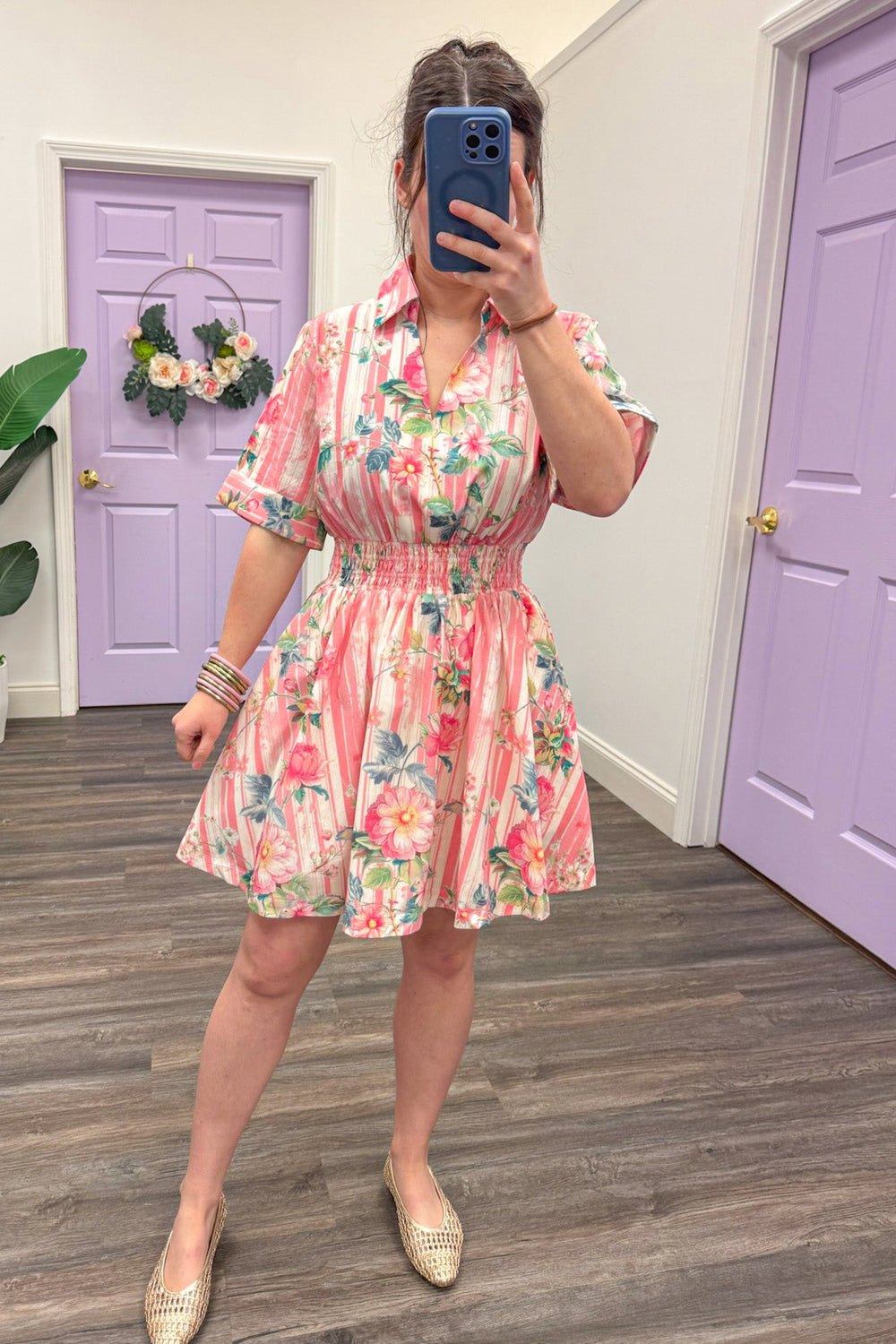 coral pink striped smocked waist mini dress with floral print