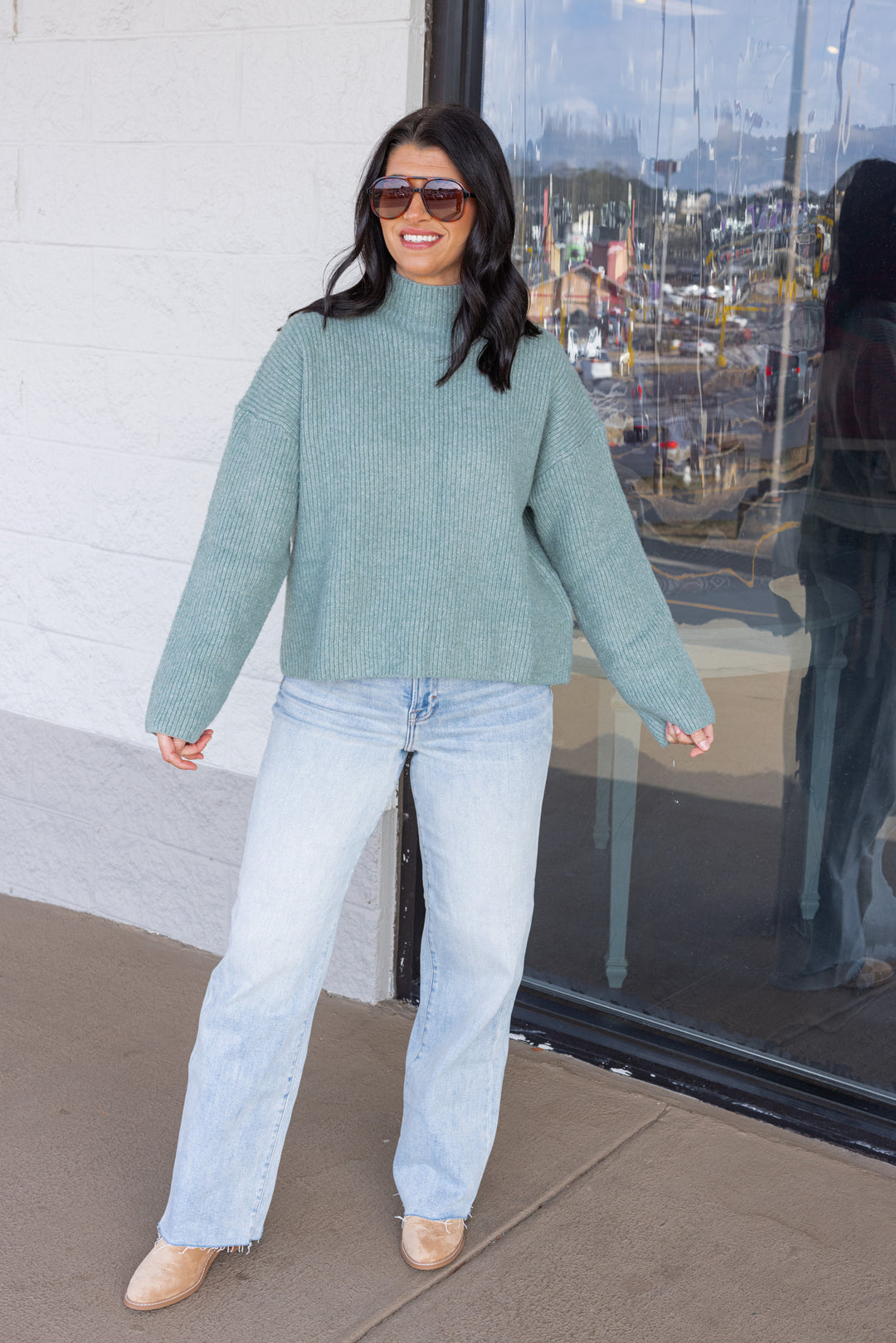 Women's pistachio green ribbed knit sweater by Wishlist showing full front view